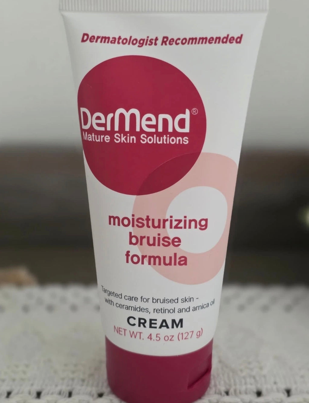 Two full-size sealed Dermend Bruise Cream containers by Beauty and Wound, 4.5 oz each, showing the cream jars with labels.