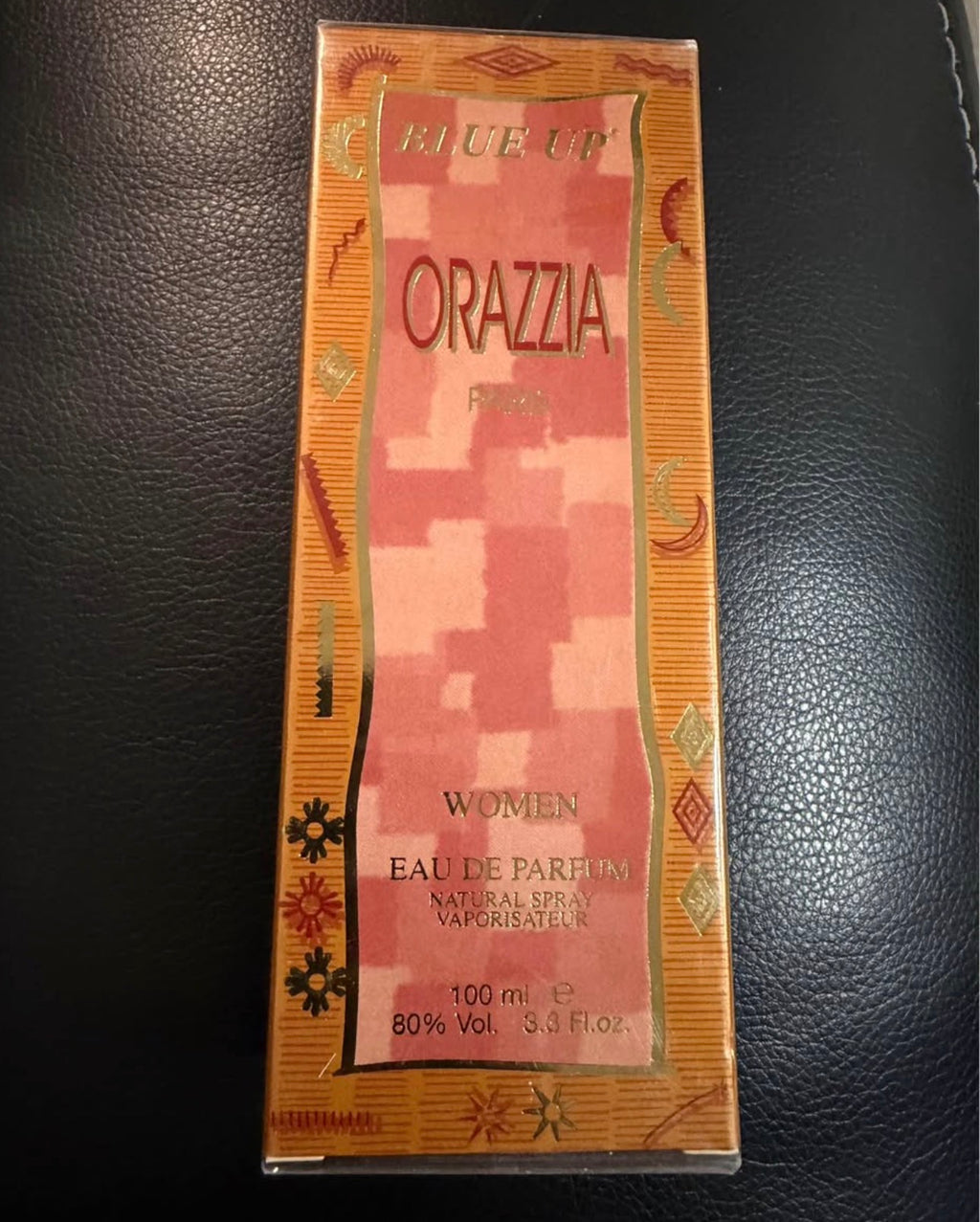 Blue Up Orazia Women Eau De Parfum bottle with floral and citrus notes, showcasing a sleek blue design by Beauty and Wound.