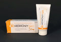Medihoney gel wound and burn dressing in a 1.5 oz tube, featuring honey-based healing properties for skin injuries.